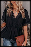 Black v-neck blouse with lace detail