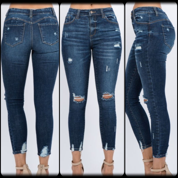 Ankle distressed skinny jeans