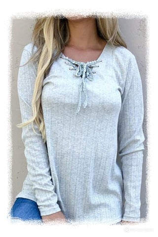 Long sleeve lace up front top